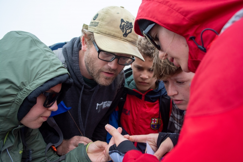 Identifying tiny creatures left behind in the samples with Bradley's help