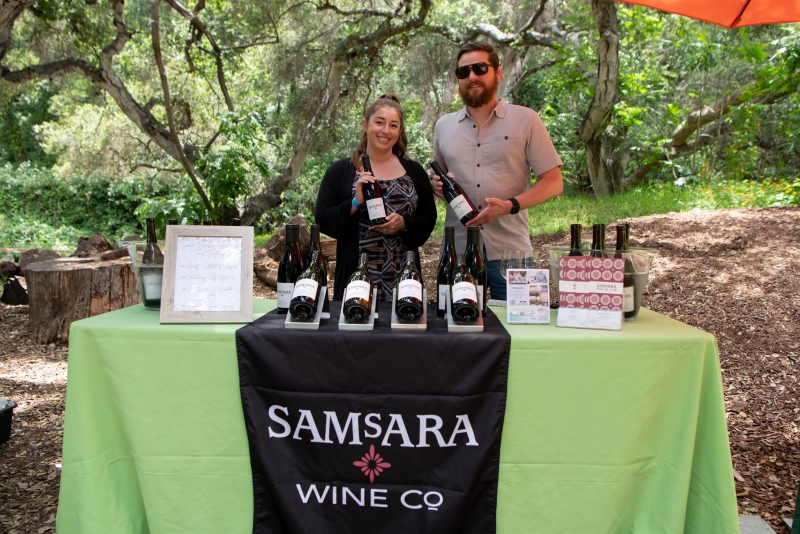 Guests enjoying wine tasting in the Museum Backyard at the Santa Barbara Museum of Natural History