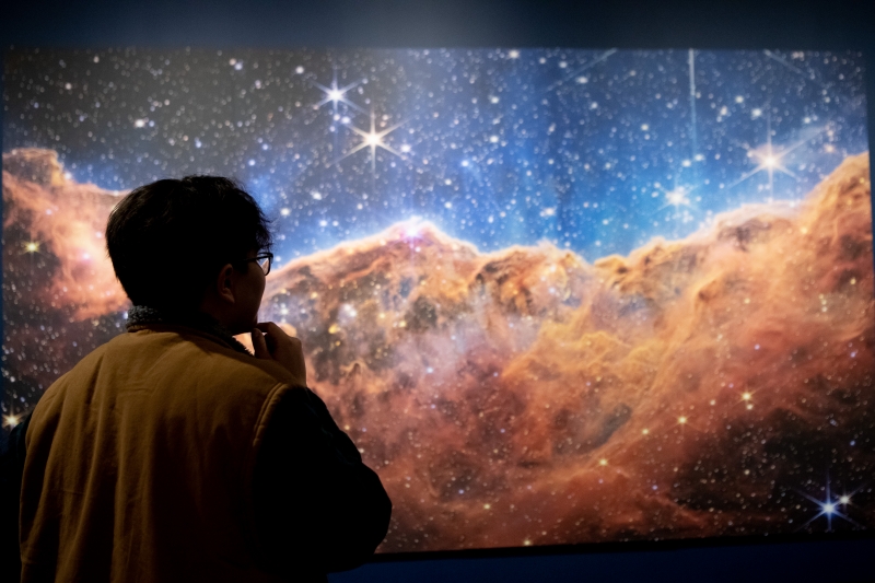 Gazing at a remarkable image from the James Webb Space Telescope, the shimmering landscape of a nebula