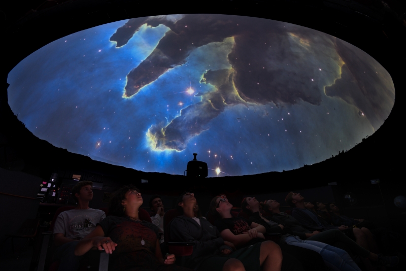 Museum visitors enjoying Planetarium Show
