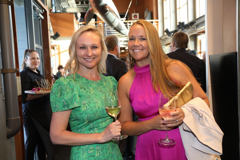 Heather Hambleton and Melissa McCann enjoy the opening reception at the Seahorse Soiree