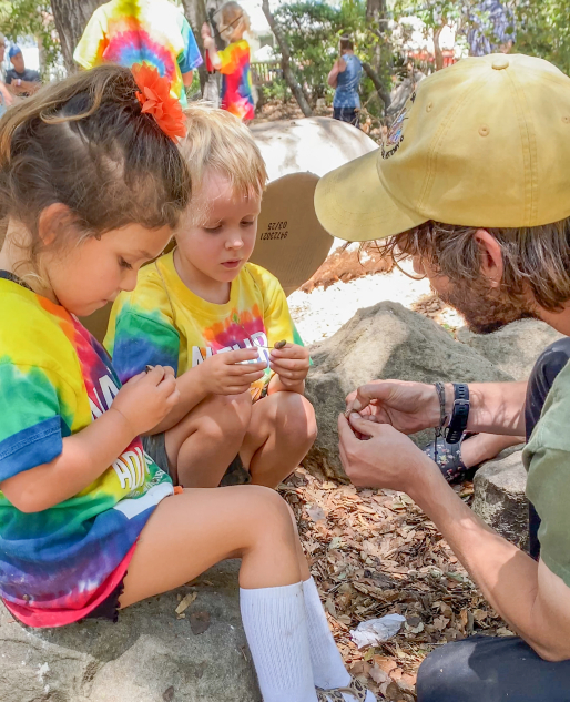 Campers exploring the Museum backyard